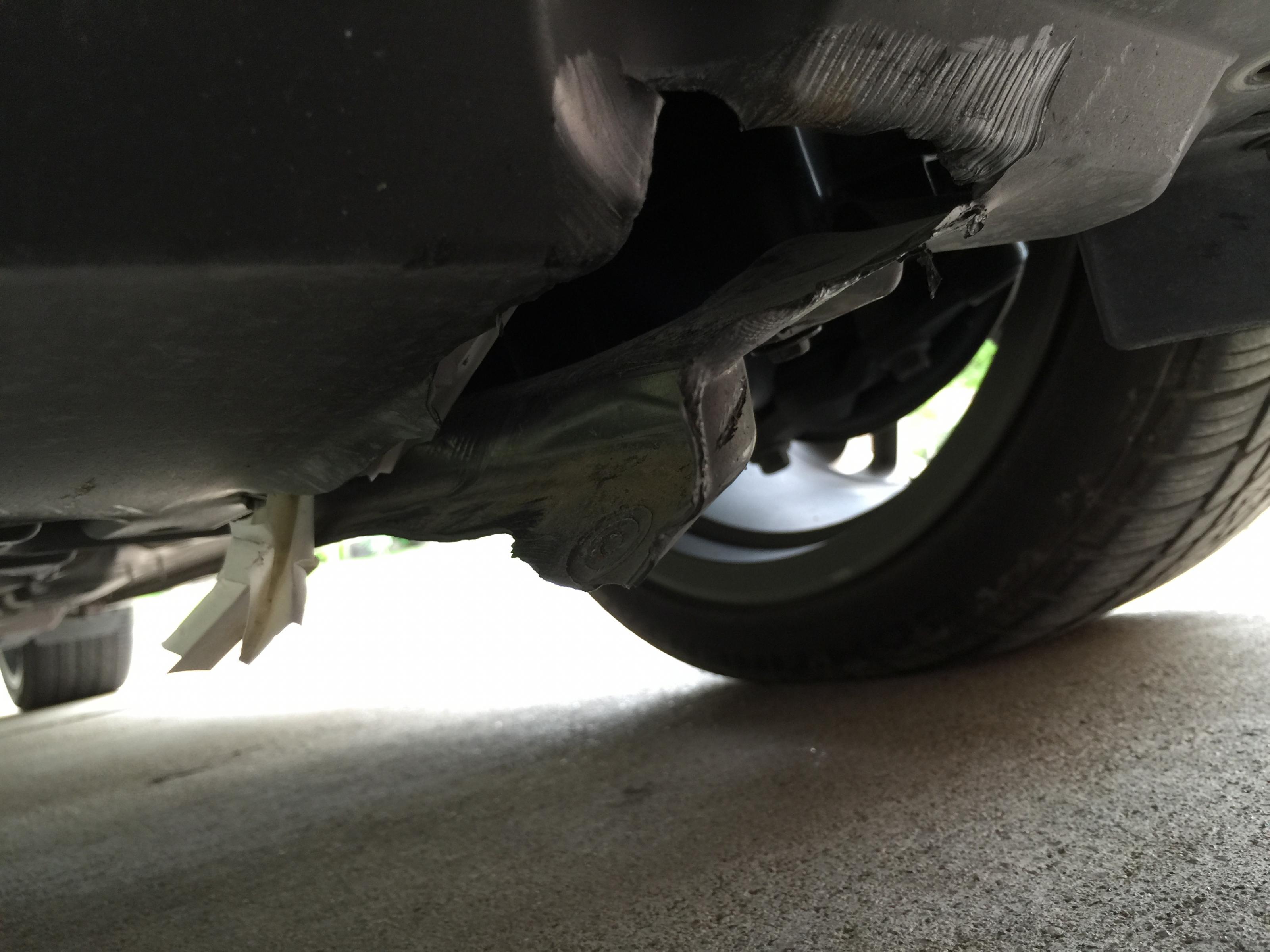 Undercarriage damage bmw #6