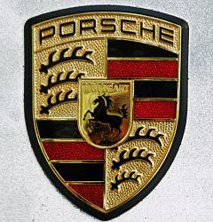 Cavalino Rampante ( famous Ferrari symbol) may have come from Stuggart-porsche-symbol.jpg