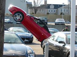 Ferrari F430 spider falls off delivery truck while being delivered-500x_ferrari-falls-on-ass.jpg