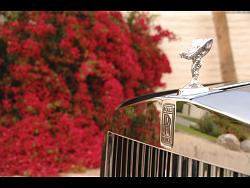 The story of the world famous  Rolls Royce Spirit of Ecstasy symbol-2009-rolls-royce-phantom-hood-ornament-spirit-of-ecstasy-2-1280x960.jpg