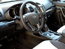 Piano Black/Blackwood/White or light color leather/Contrasted interior thread-2011-kia-sorento-design-dashboard-large-.jpg