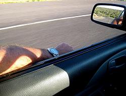 Report: Driving can contribute to deadliest cancer, particularly on your left side-arm-out-window.jpg