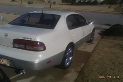 q's-Looking To Upgrade!!! (suspension, offset for 20's, Headlights HID's, Cd players)-imag0035.jpg