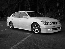 Lowered on Stock wheels VS. Big Wheels on stock height??-blackandwhite.jpg