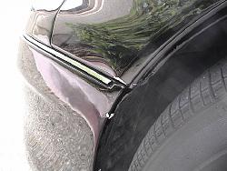 Disaster Strikes - Tire debris damage to my bodykit!!!-damage-1.jpg