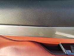 TSB:Aluminum Door Panel Trim Dented by Seat Belt Latchplate-trim.jpg