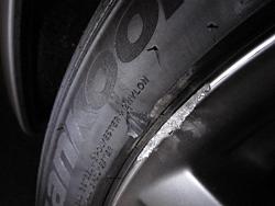 Curbed, does it need a new tire?-tire_curb.jpg