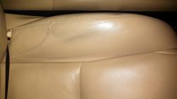 Looking for suggestions on removing blue jean stain on tan leather-seat.jpg