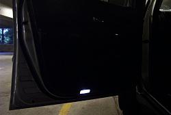 My RX350 w/ lighting upgrades-doorlight.jpg