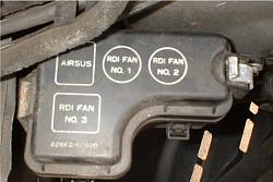 No more overheating...  A/C Fan works-ac-fan-and-air-sus-fuse-cover.jpg