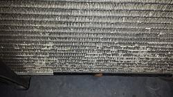 AC Condenser Rock Damage-20140218_174446.jpg