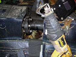 The good news....... I found a quicker way to the driveshaft bolts.-engine-1-.jpg