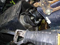 The good news....... I found a quicker way to the driveshaft bolts.-engine-2-.jpg