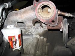 Cracked exhaust manifold.-frontmani1.jpg