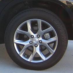 What are these wheels? Chrome/Aluminum/Other?-wheel.jpg
