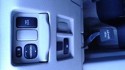 What are these spaces for in other trim levels-20150526_182634-1-.jpg