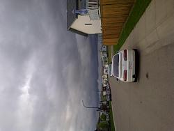 updated pics of levie's soarer-back-of-car-stormy-sky.jpg