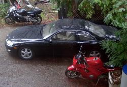 Post pics of your SC with OTHER cars in your driveway-sc400-n-bikes.jpg