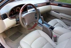 Wood Steering wheel upgrade or HID conversion ???-american_stitches_steering_wheel.jpg