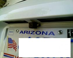 Looking for vendor who sells and installs rear view cameras-attached-to-above-plate.jpg